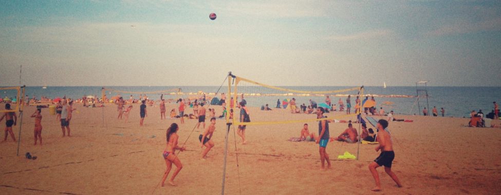 volleyball on the beach in Barcelona - a fun way to stay fit while traveling